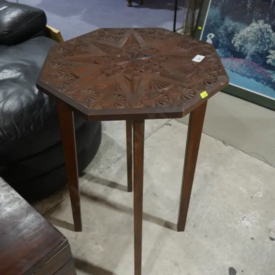 Carved top table
