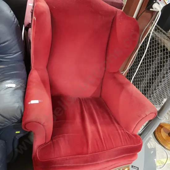 Red wingback armchair