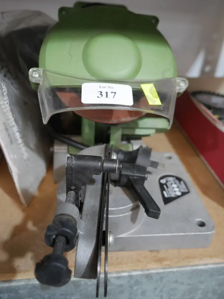 Electric chainsaw sharpener Image 1++