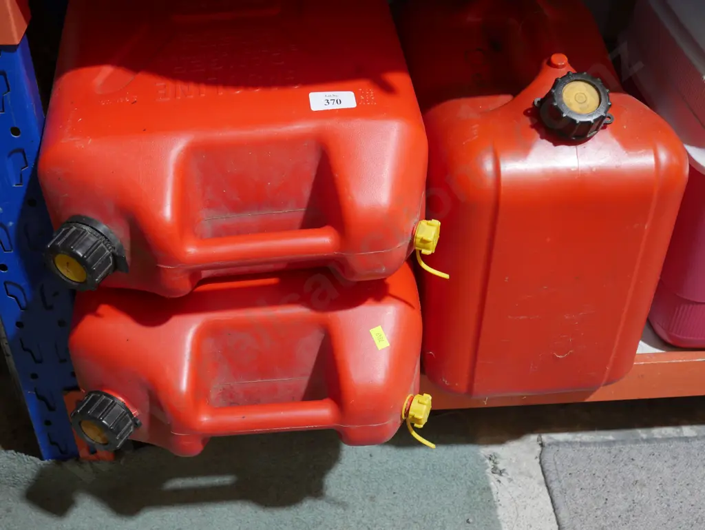 3 petrol containers Image 1++