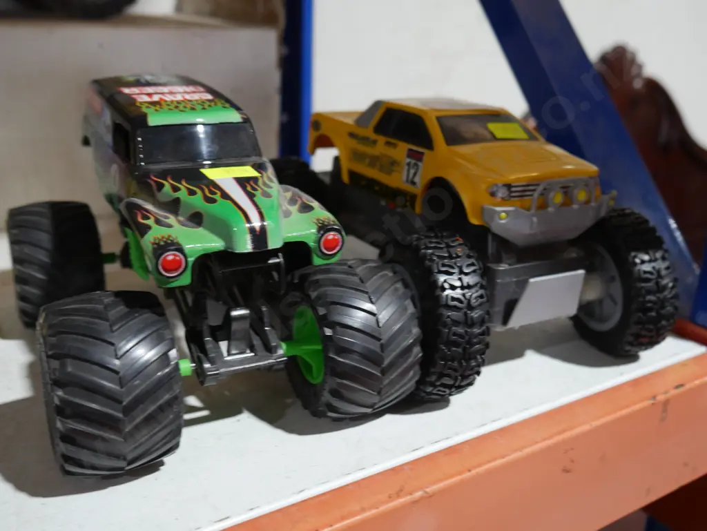 2 monster trucks Image 1++