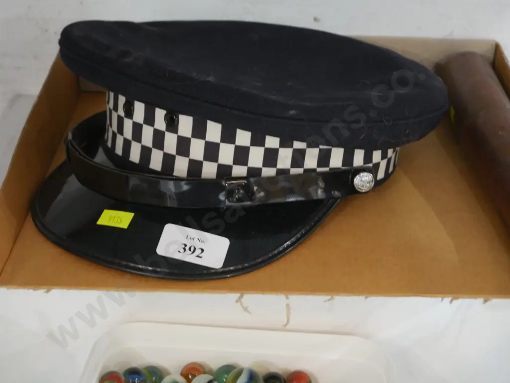 Police cap and baton Image 1++