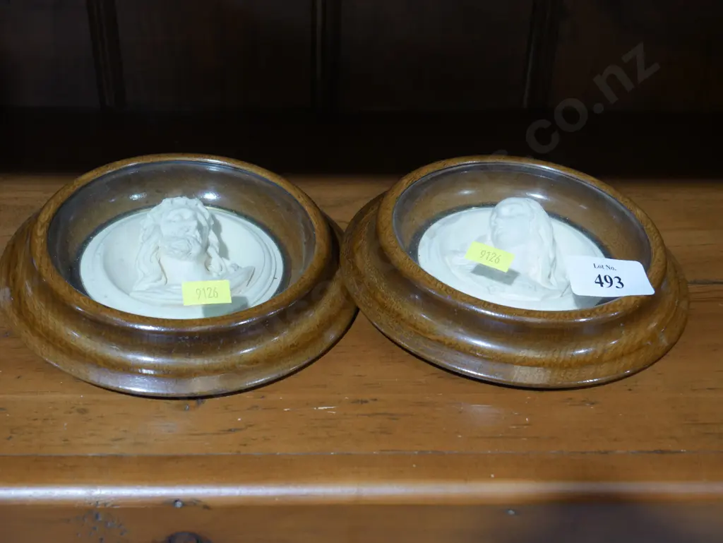 2 wood framed religious figures Image 1++