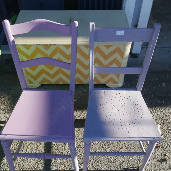 2 purple wooden chairs