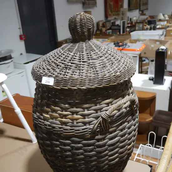 Cane lidded basket