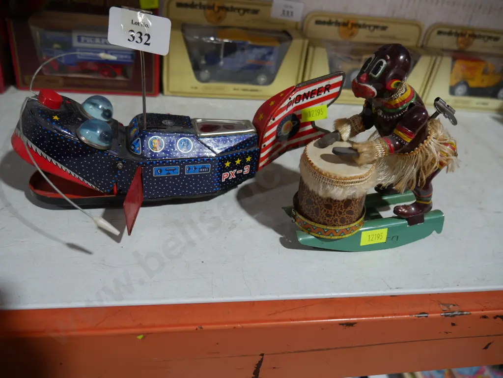 2 Wind up tin toys Image 1++