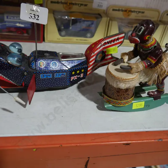 2 Wind up tin toys
