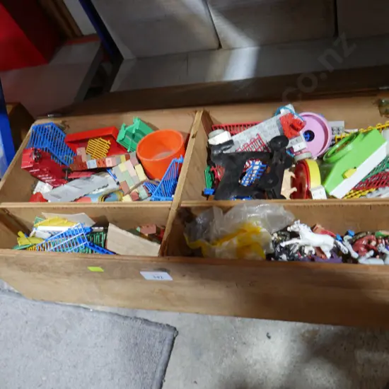 Wooden box of toys