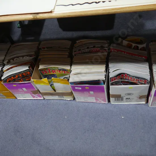 Seven boxes of assorted car magazines etc