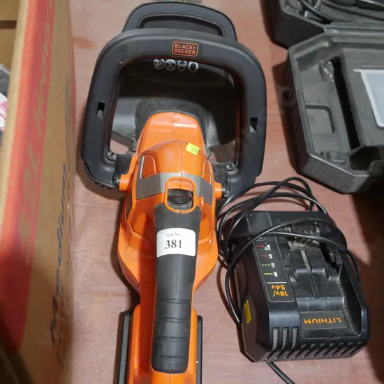 Black & Decker hedge trimmer with battery and charger