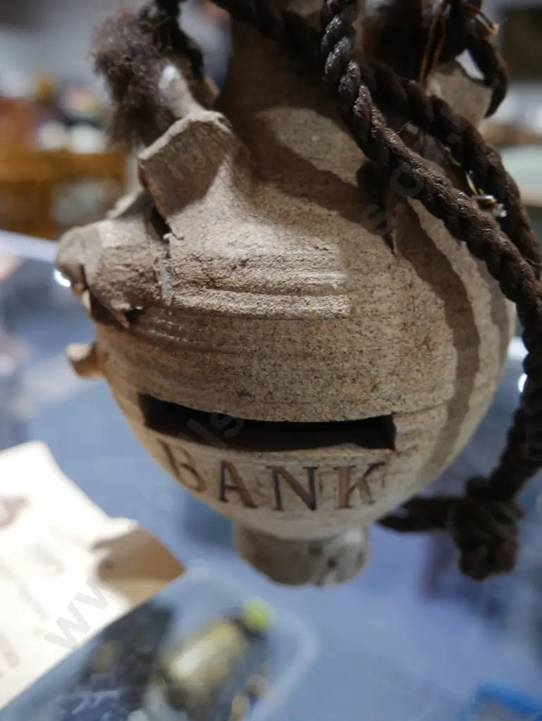 Pottery piggy bank and coins Image 1++