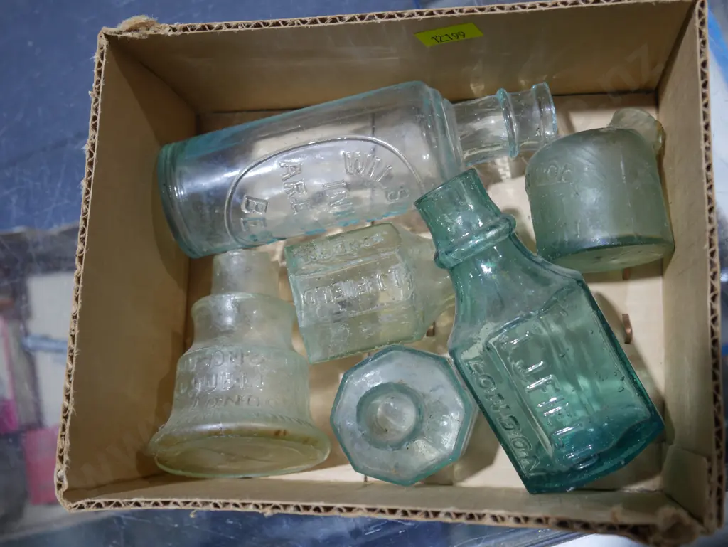 Assorted glass bottles Image 1++