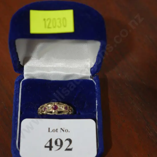 Gold and garnet ring