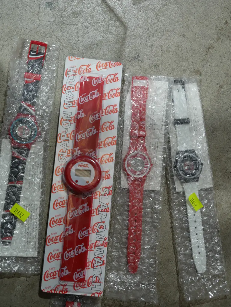 Assorted Coca-Cola watches Image 1++
