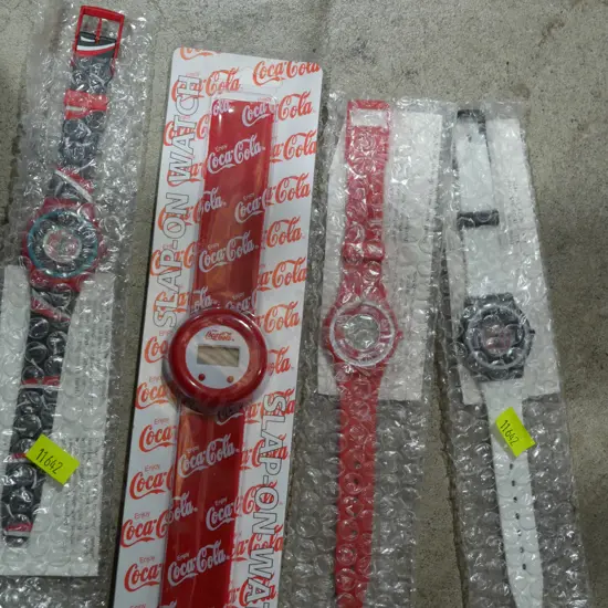 Assorted Coca-Cola watches