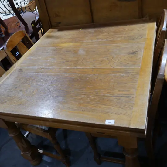 Extendable dining table and four chairs