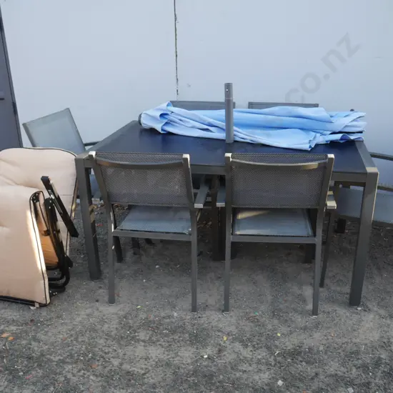 Glass top outdoor table and six chairs