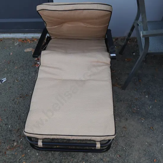 Folding outdoor lounger