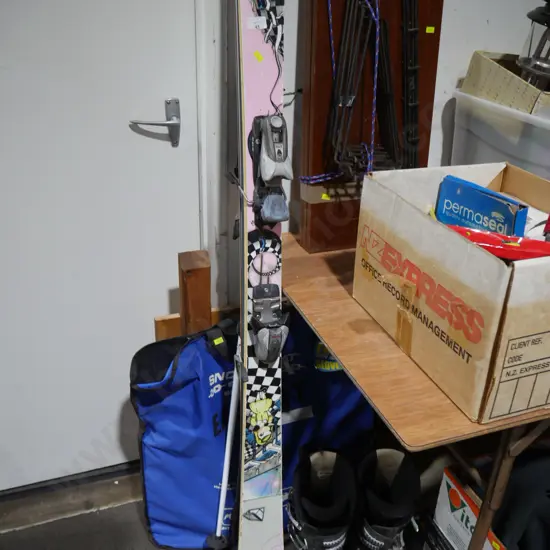 Skis and boots, snow chain
