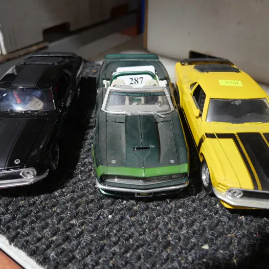 Three model cars