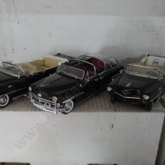 Three model cars