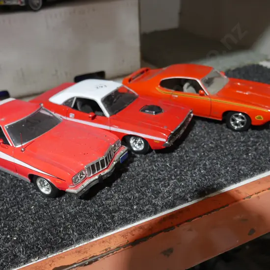 Three model cars