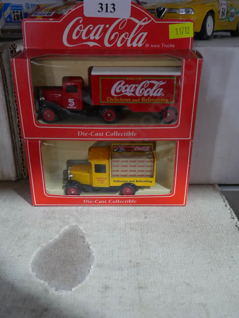 2 model Coca-Cola trucks Image 1++