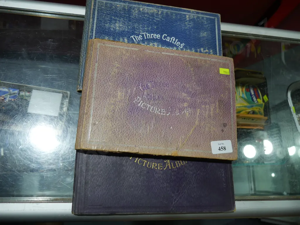 Three cigarette card albums Image 1++