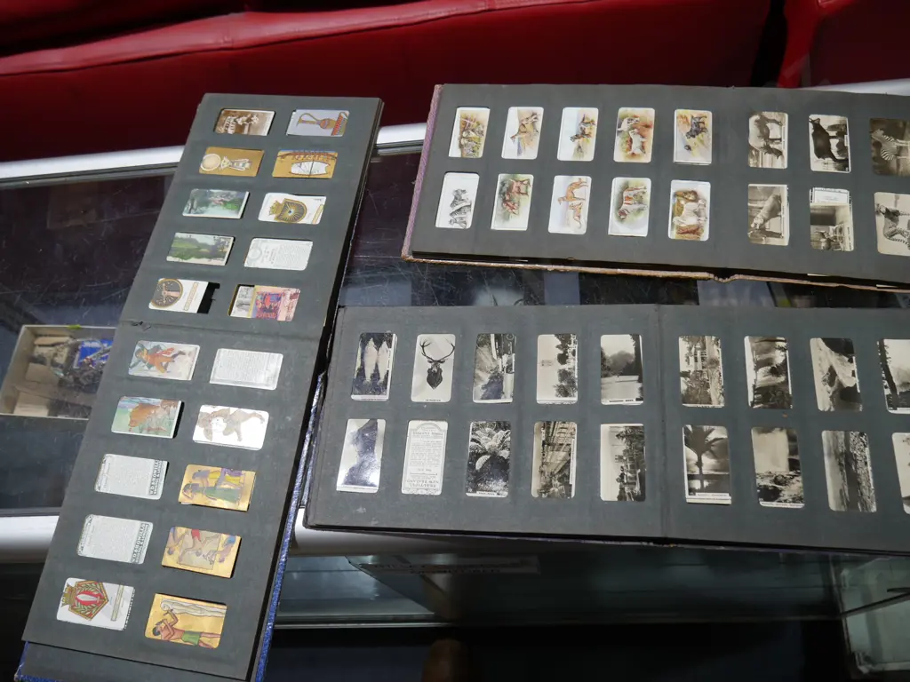 Three cigarette card albums Image 1++