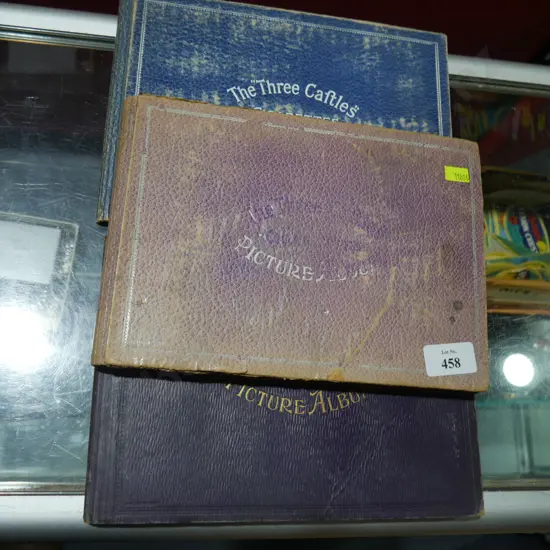 Three cigarette card albums