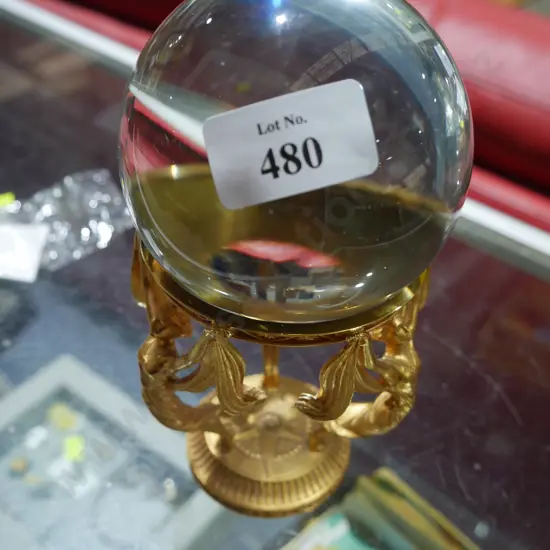 Glass ball on stand