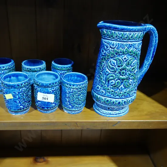 Pottery jug and cups