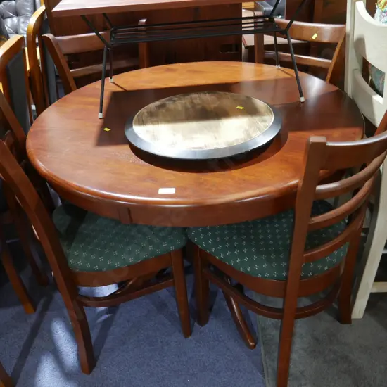 Round dining table and four chairs