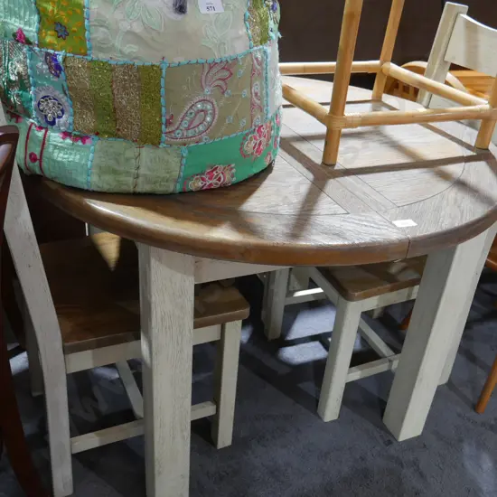 Extendable round dining table and three chairs