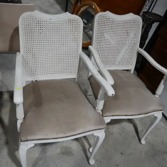 Two white armchairs