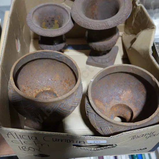 4 small cast pots