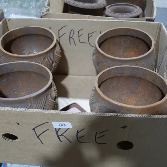 4 small cast pots