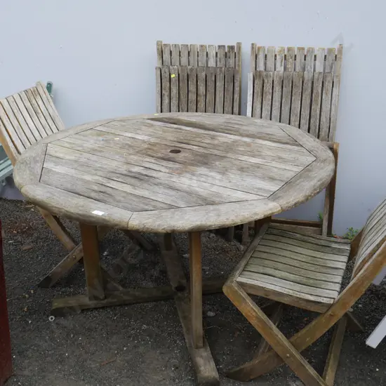 Wooden outdoor table and four chairs
