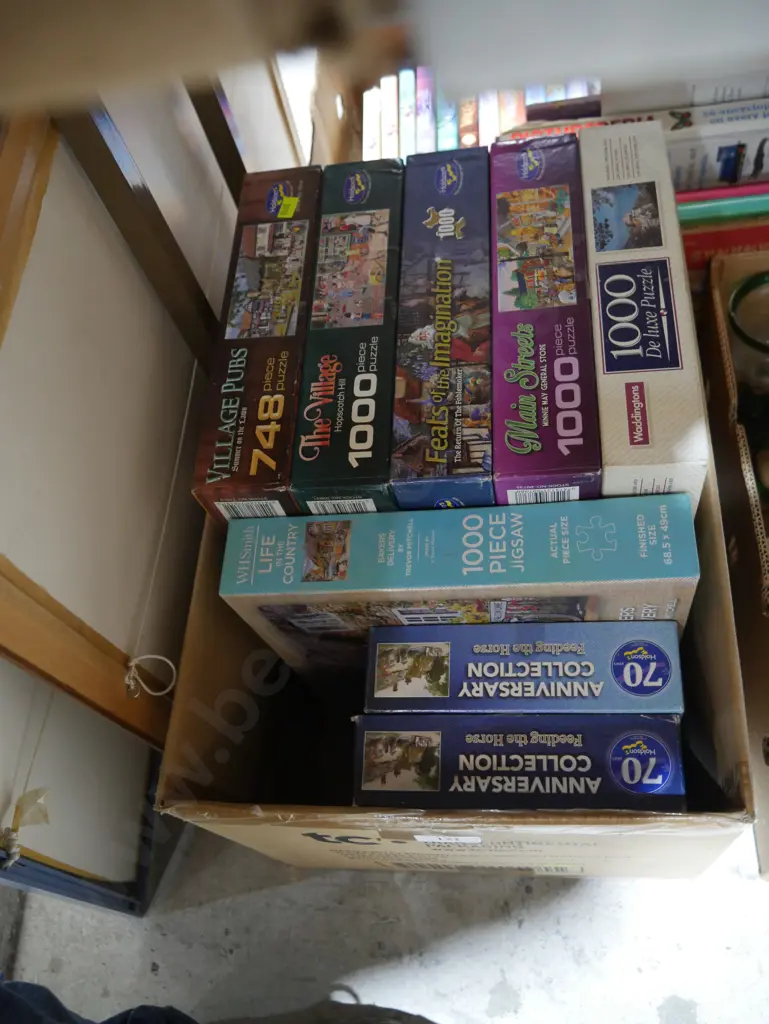 Box of jigsaw puzzles Image 1++