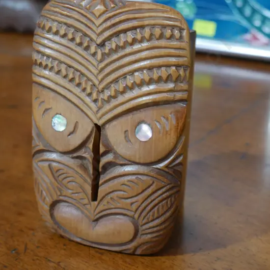 Wooden carved Maori money box