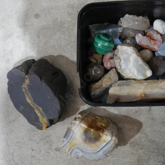 Container of gemstones