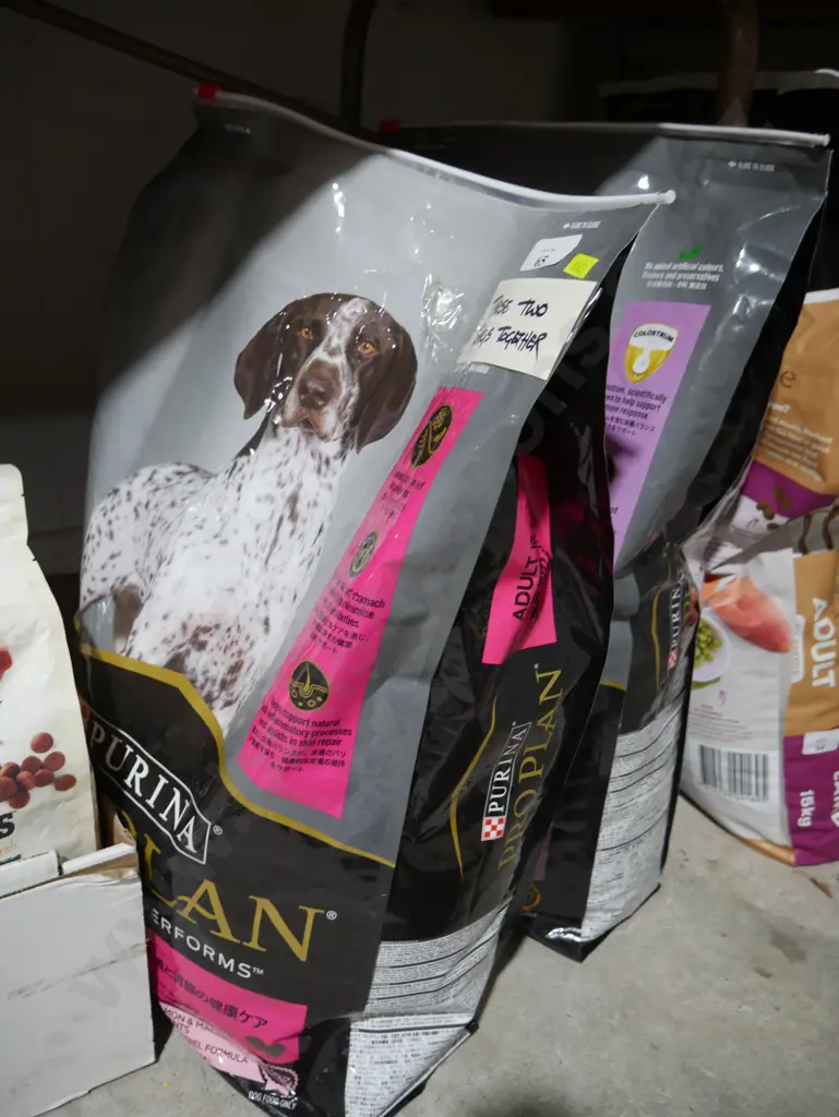 2 bags Purina dog food Image 1++
