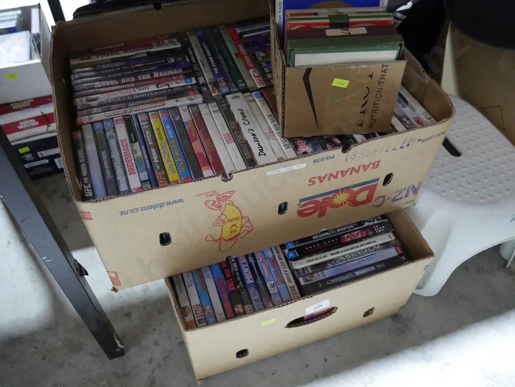 2 boxes of dvds Image 1++