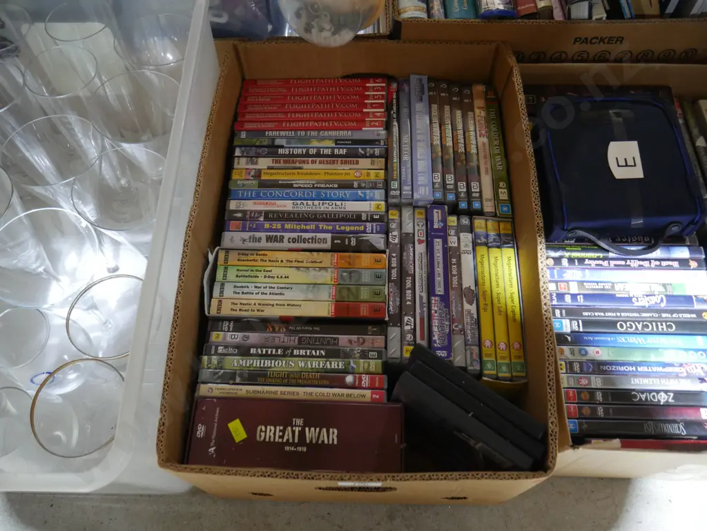 2 boxes of dvds Image 1++