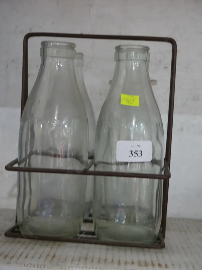 4 glass milk bottles and holder Image 1++
