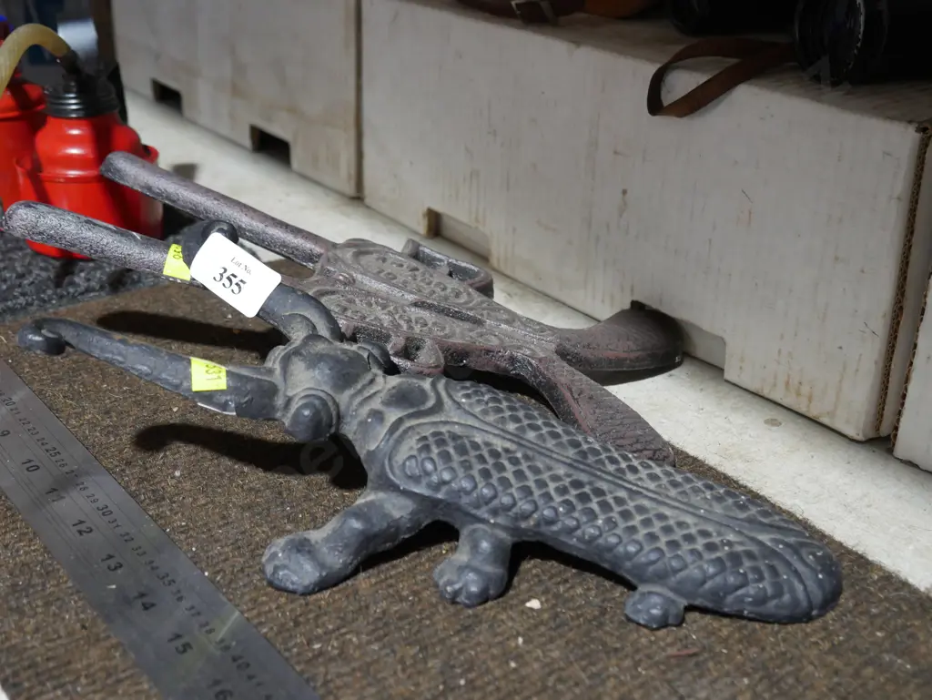 Cast iron beetle and pistols boot jacks Image 1++