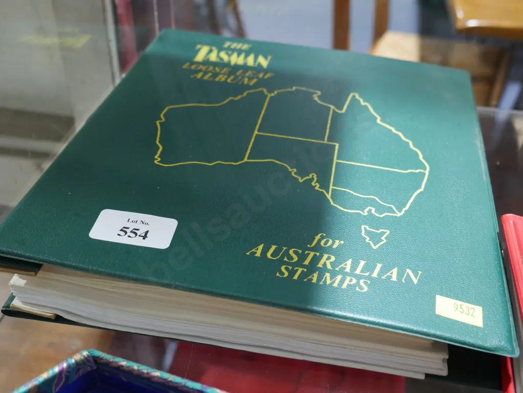 Green Australian stamp album Image 1++