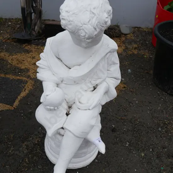 Concrete boy statue