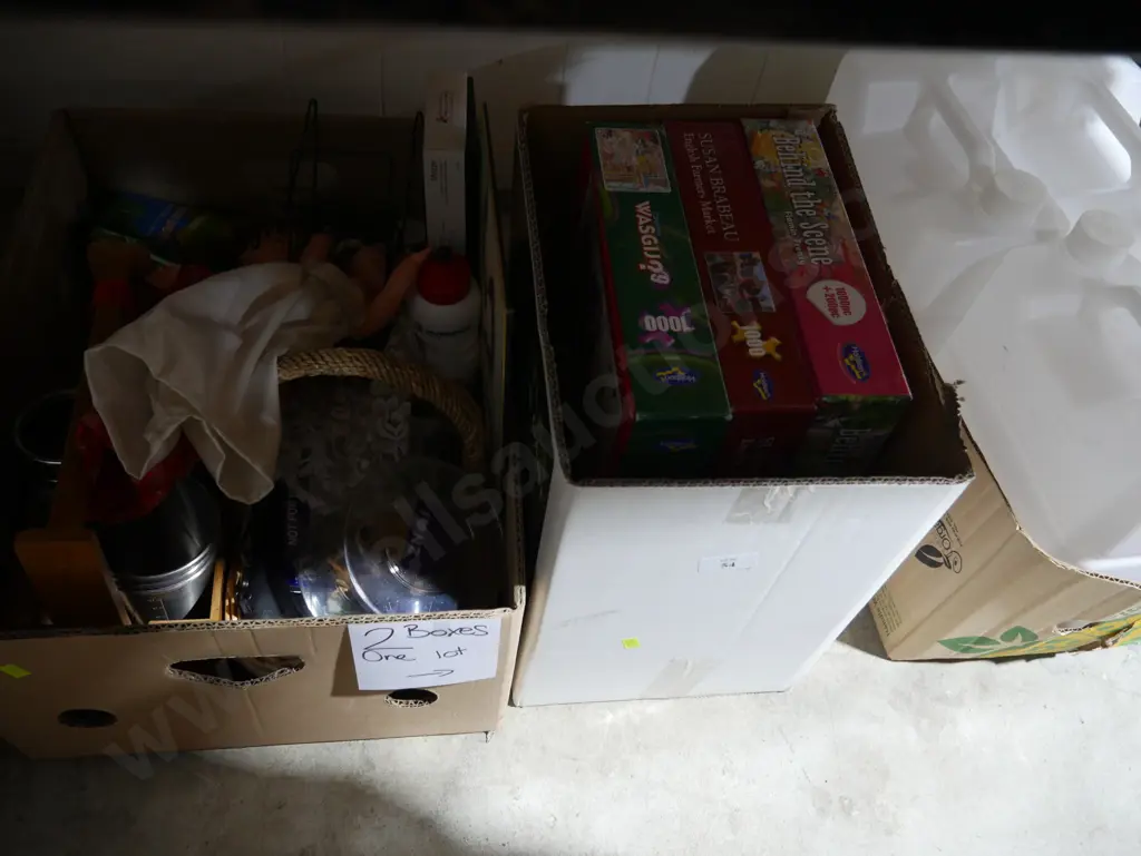 Two boxes of jigsaw puzzles, dolls etc Image 1++