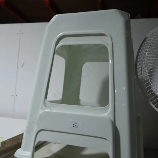 Two plastic stools